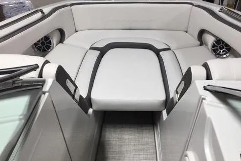 Slide: The Image of 2024 Crownline Eclipse E240 XS boat interior with plush seating and modern design. - 5