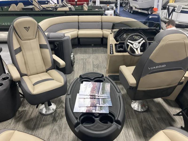 Slide: The Image of Interior of 2026 Viaggio X22Q with luxurious seating and control console. - 10