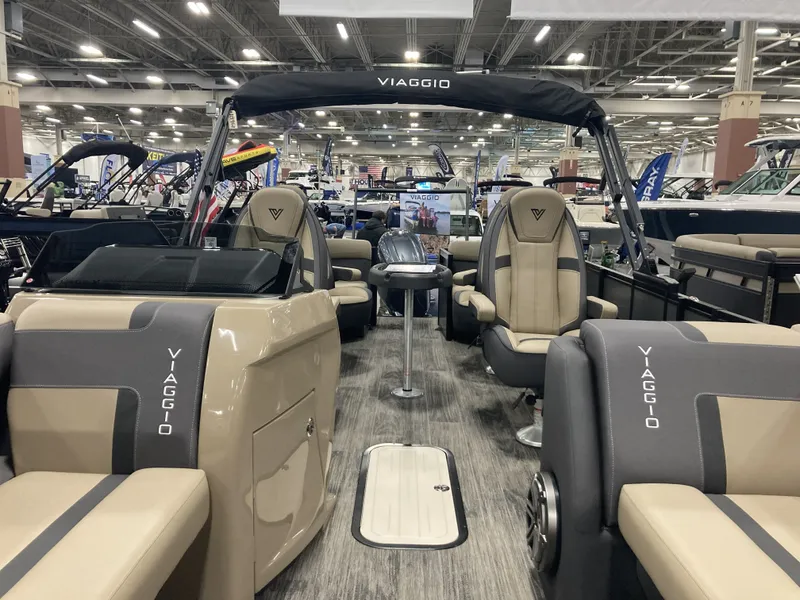 Slide: The Image of Viaggio X22Q 2026 pontoon boat in showroom. - 16