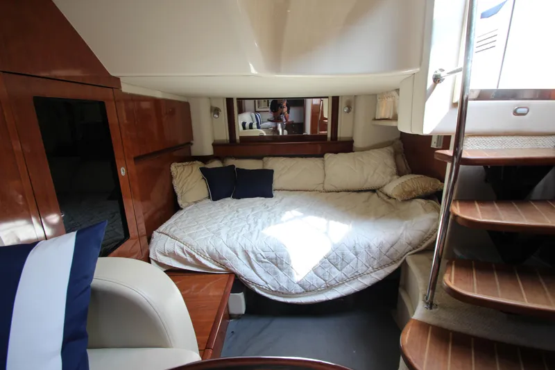 Slide: The Image of Luxurious cabin interior of 2004 Sea Ray 40 Sundancer yacht with cozy bedding. - 47