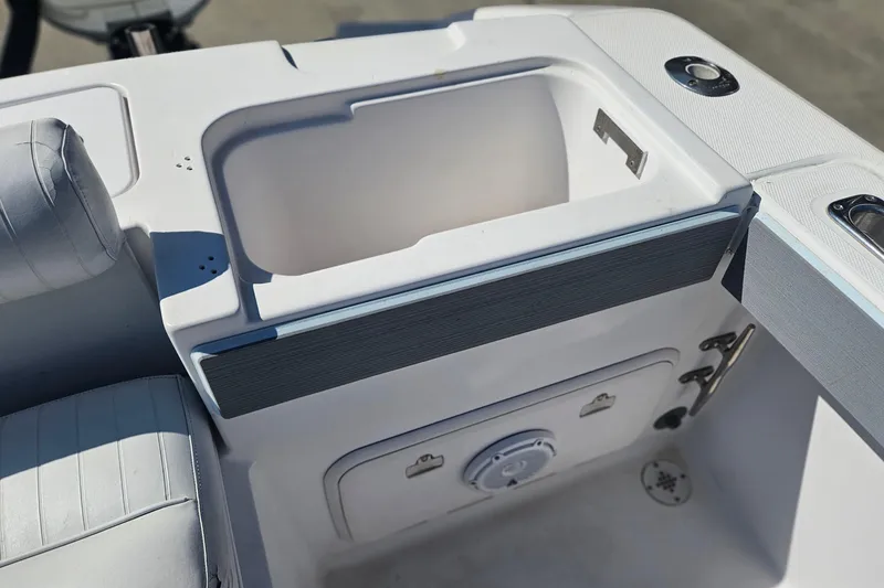 Slide: The Image of Interior view of a 2006 Donzi 32 ZF boat, featuring a storage compartment. - 14