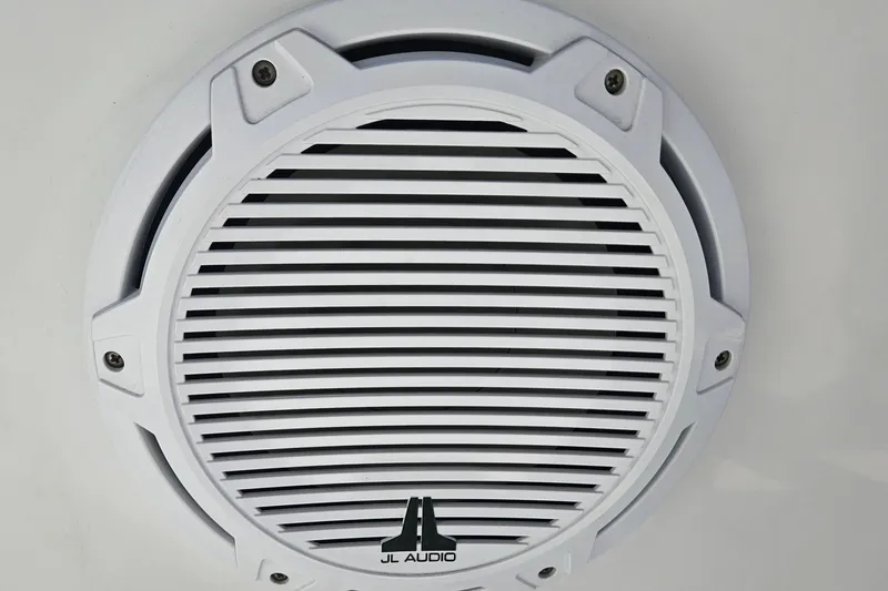 Slide: The Image of White JL Audio speaker on a 2006 Donzi 32 ZF boat. - 25