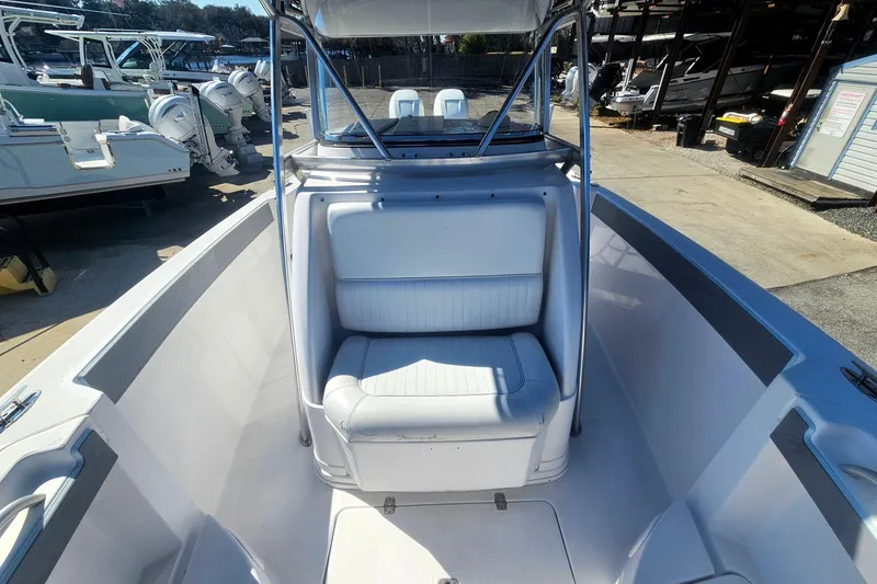 Slide: The Image of 2006 Donzi 32 ZF boat interior with white seating and sleek design. - 30