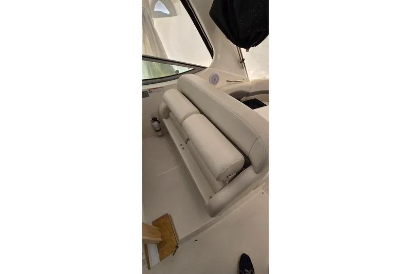 Slide: The Image of 2006 Chaparral Signature 310 boat interior with white seating and sleek design. - 14