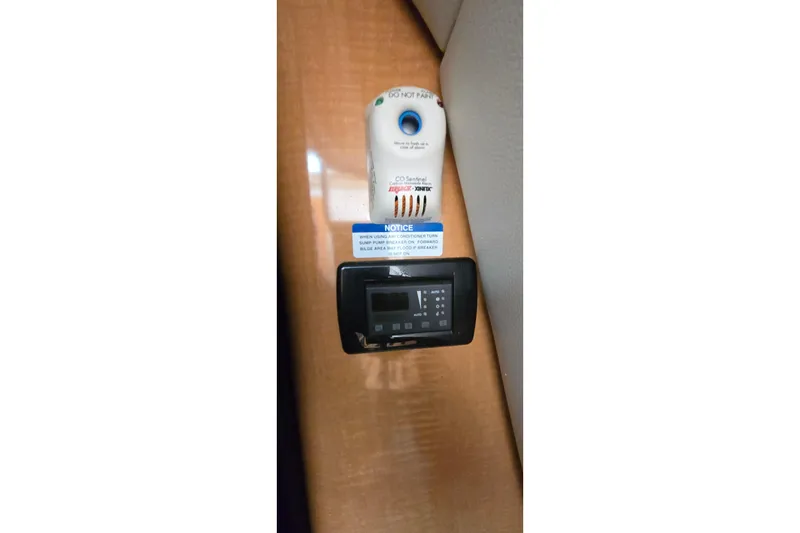 Slide: The Image of 2006 Chaparral Signature 310 interior control panel and safety device. - 24