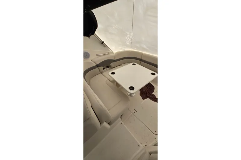 Slide: The Image of 2006 Chaparral Signature 310 boat interior with seating and table. - 5
