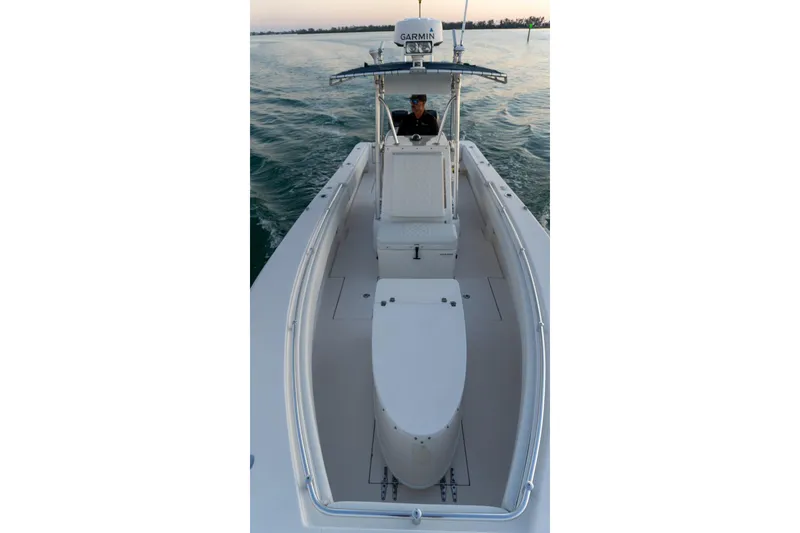 Slide: The Image of 2005 Contender 27 Tournament boat on water, featuring center console and Garmin equipment. - 25