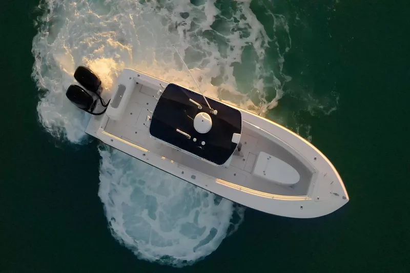 Slide: The Image of Aerial view of 2005 Contender 27 Tournament boat navigating ocean waters. - 6