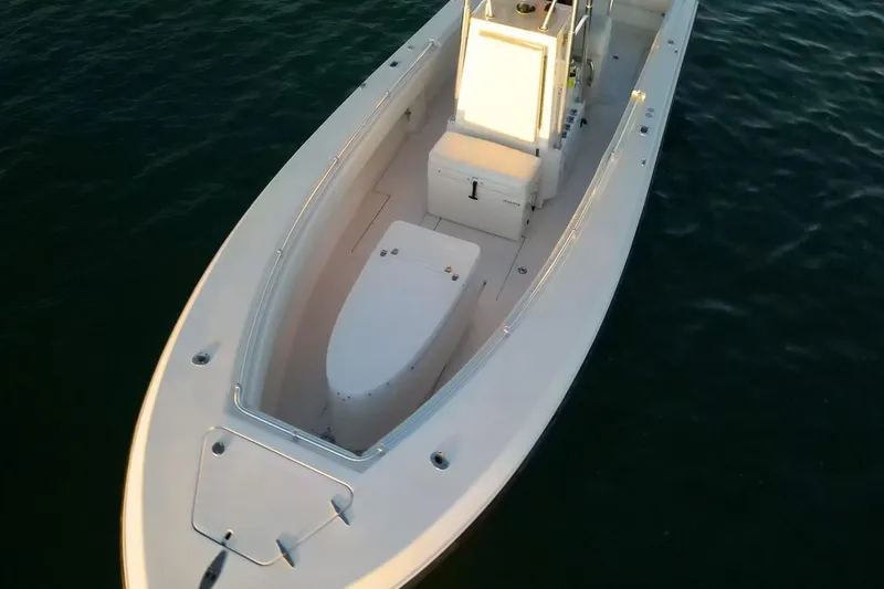 Slide: The Image of 2005 Contender 27 Tournament boat on calm water, aerial view. - 9