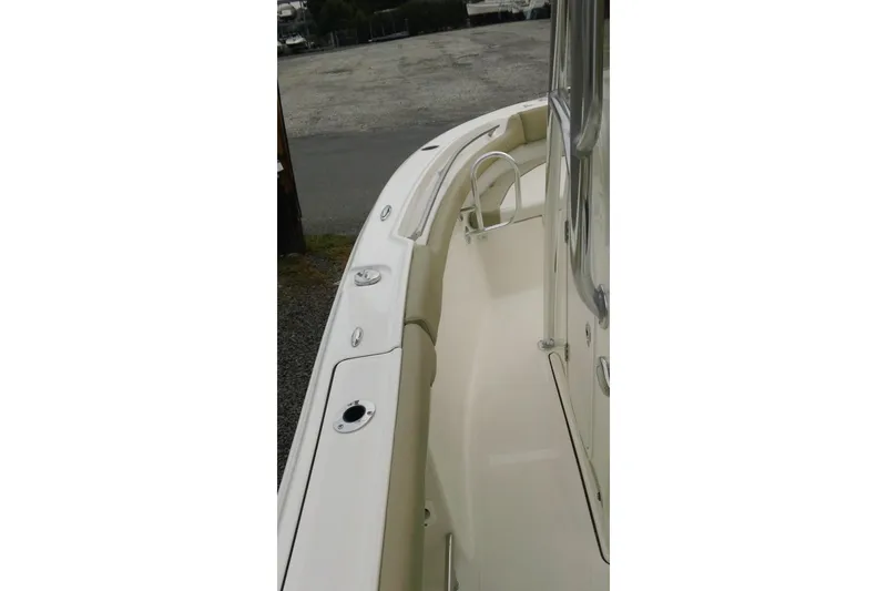 Slide: The Image of 2026 Pioneer 202 Islander boat deck with sleek design and stainless steel fittings. - 17