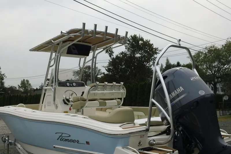 Slide: The Image of 2026 Pioneer 202 Islander boat with Yamaha 200 engine, featuring sleek design and modern amenities. - 3