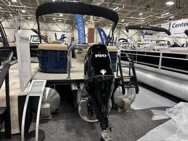 Slide: The Image of Godfrey EX2286SBX 2026 pontoon boat with 150 HP engine at exhibition. - 5