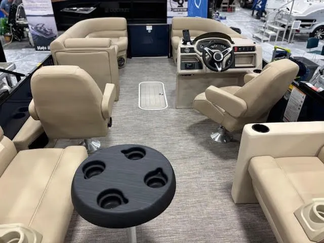 Slide: The Image of Interior of 2026 Godfrey EX2286SBX pontoon boat with beige seating. - 8