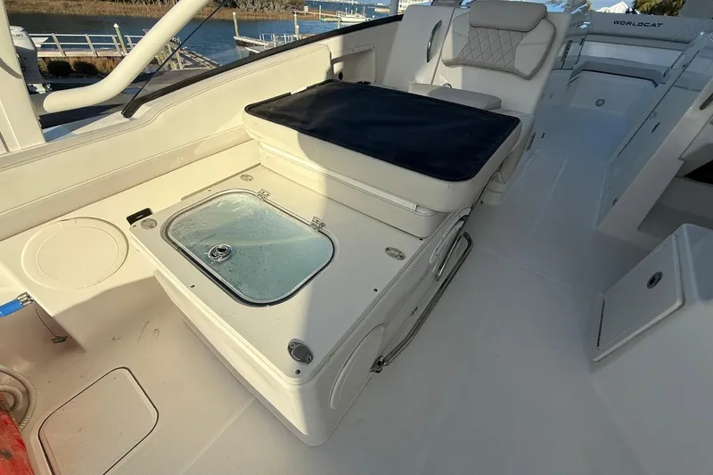 Slide: The Image of 2024 World Cat 280 DC-X boat interior with seating and storage compartments. - 12