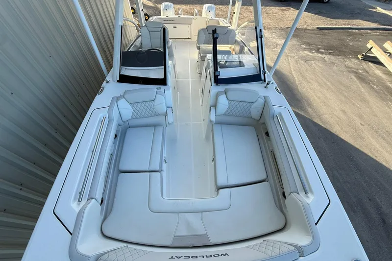 Slide: The Image of 2024 World Cat 280 DC-X boat with spacious seating and modern design. - 21