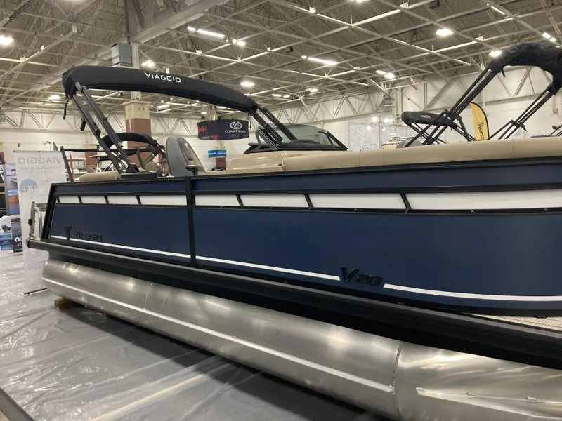 Slide: The Image of Viaggio V20U pontoon boat 2026 in an exhibition hall. - 2
