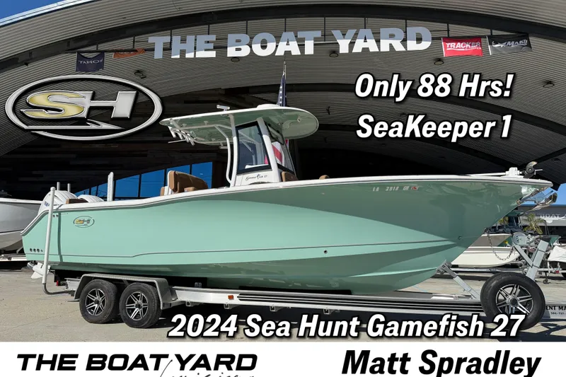 The Image of 2024 Sea Hunt Gamefish 27 boat on trailer at The Boat Yard dealership. - 1
