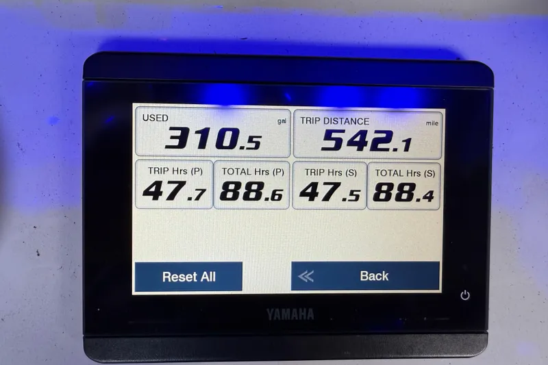 Slide: The Image of Display screen showing fuel usage and trip data for 2024 Sea Hunt Gamefish 27. - 22