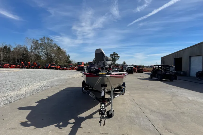 Slide: The Image of 2013 Tracker Pro Team 175 TXW boat on trailer in outdoor lot. - 7