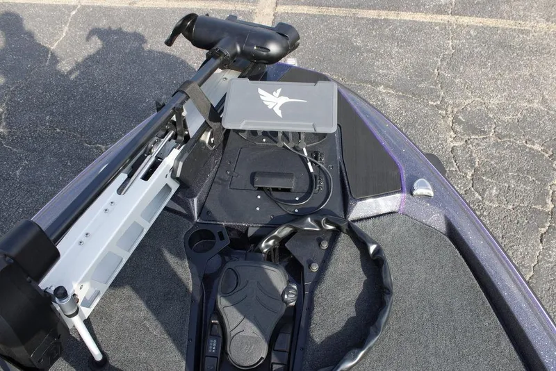 Slide: The Image of 2026 Skeeter ZXE20 boat deck with trolling motor and control panel. - 26