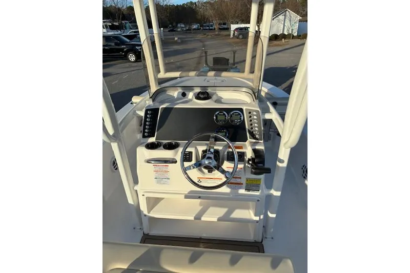 Slide: The Image of Helm console of the 2026 Robalo 226 Cayman boat. - 12