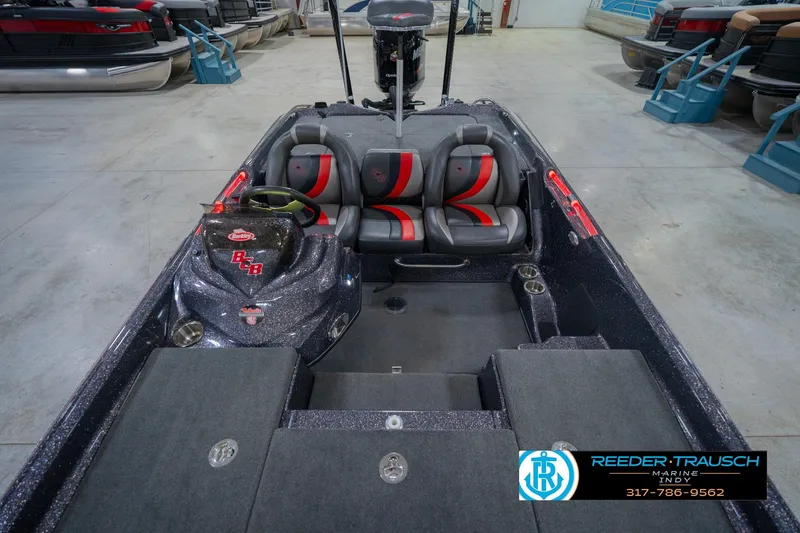 Slide: The Image of Interior of a 2016 Bass Cat Cougar boat in a warehouse. - 19