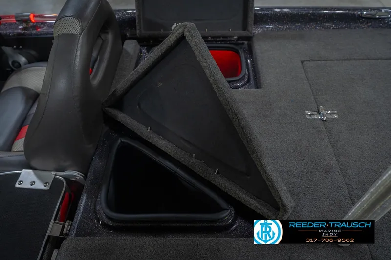 Slide: The Image of 2016 Bass Cat Cougar boat interior storage compartments and seating. - 22