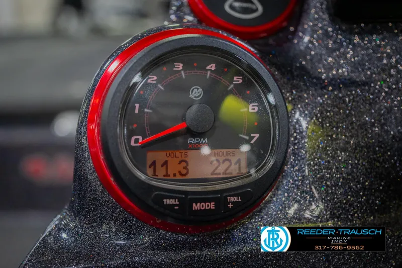 Slide: The Image of Close-up of 2016 Bass Cat Cougar boat tachometer displaying 11.3 volts and 221 hours. - 31