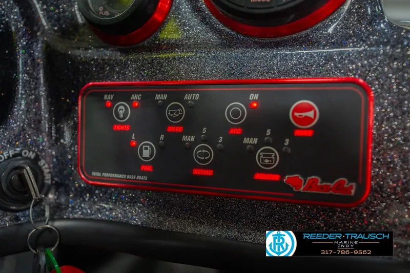 Slide: The Image of Control panel of a 2016 Bass Cat Cougar boat with various switches and indicators. - 35