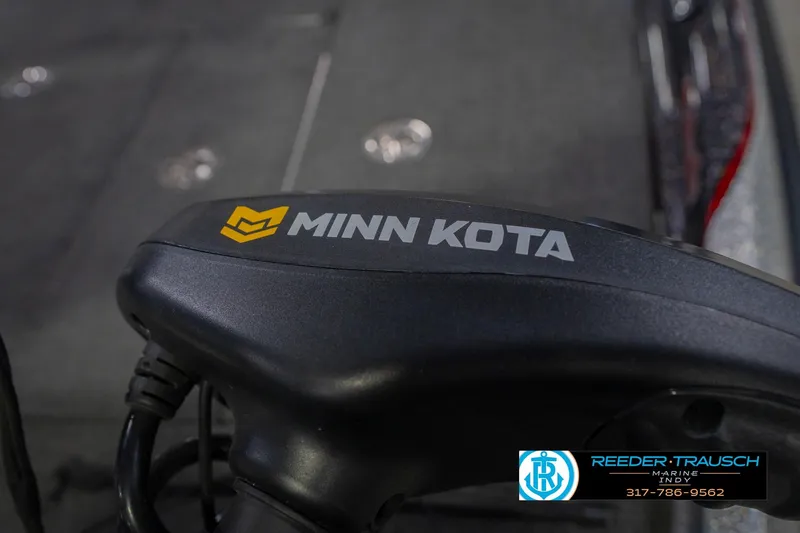 Slide: The Image of Minn Kota motor on 2016 Bass Cat Cougar boat, Reeder-Trausch Marine logo visible. - 54