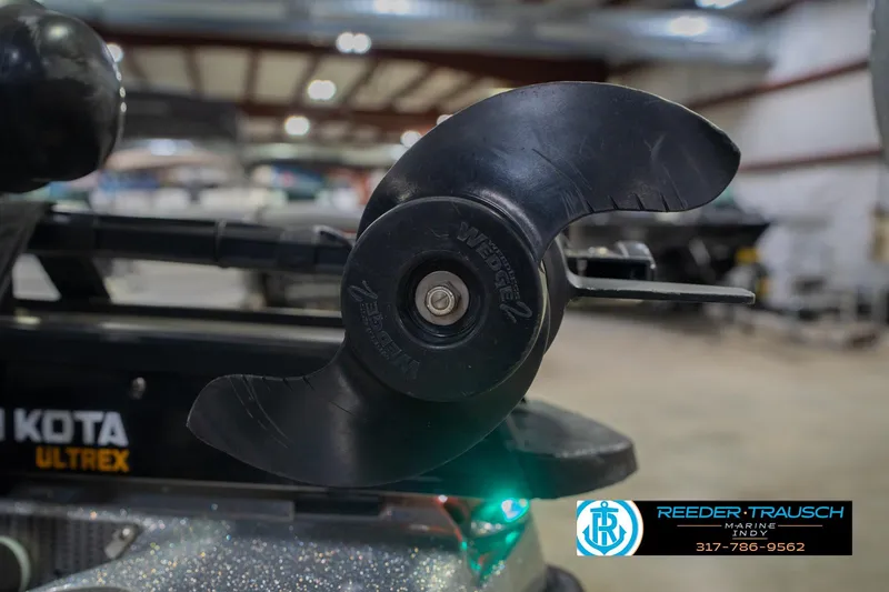 Slide: The Image of 2016 Bass Cat Cougar with Minn Kota Ultrex motor in a showroom. - 55