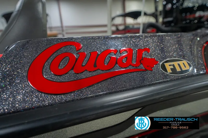 Slide: The Image of 2016 Bass Cat Cougar boat logo with glittery finish and FTD emblem. - 57