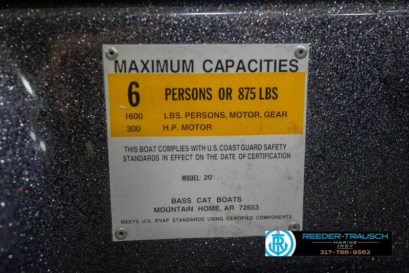 Slide: The Image of 2016 Bass Cat Cougar capacity label, maximum 6 persons or 875 lbs, 300 HP motor. - 65
