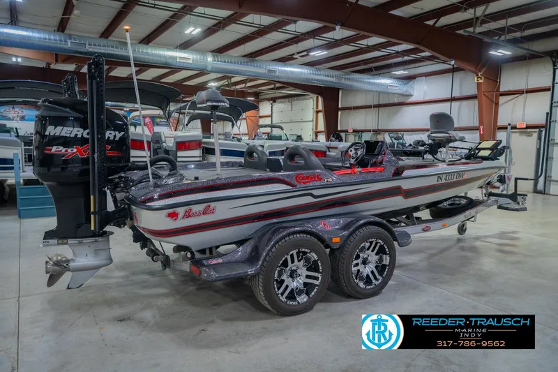 Slide: The Image of 2016 Bass Cat Cougar boat with Mercury Pro XS engine in showroom. - 7