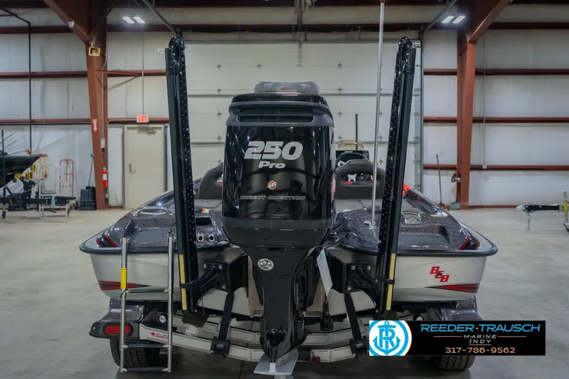 Slide: The Image of 2016 Bass Cat Cougar boat with 250 Pro engine in indoor storage. - 8