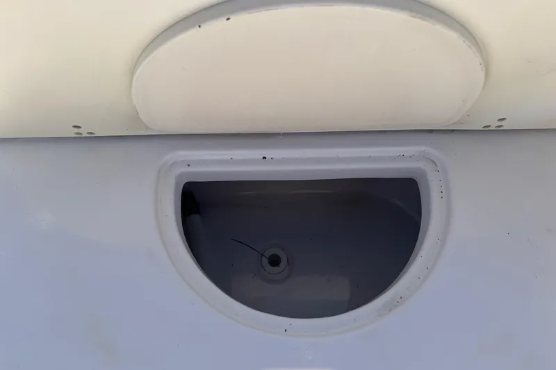 Slide: The Image of 2001 Pro-Line 30 Express boat compartment with white and gray interior details. - 36