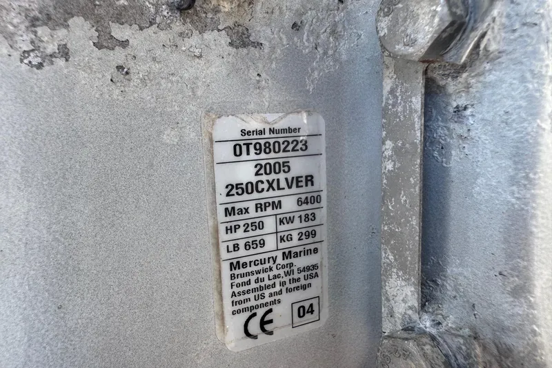 Slide: The Image of Label on Mercury Marine engine, serial OT980223, 250CXLVER, 250 HP, 2005 model. - 63