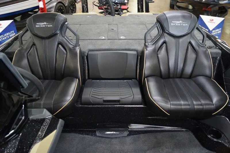 Slide: The Image of 2026 Skeeter ZXE21 boat interior with sleek black seats and modern design. - 11