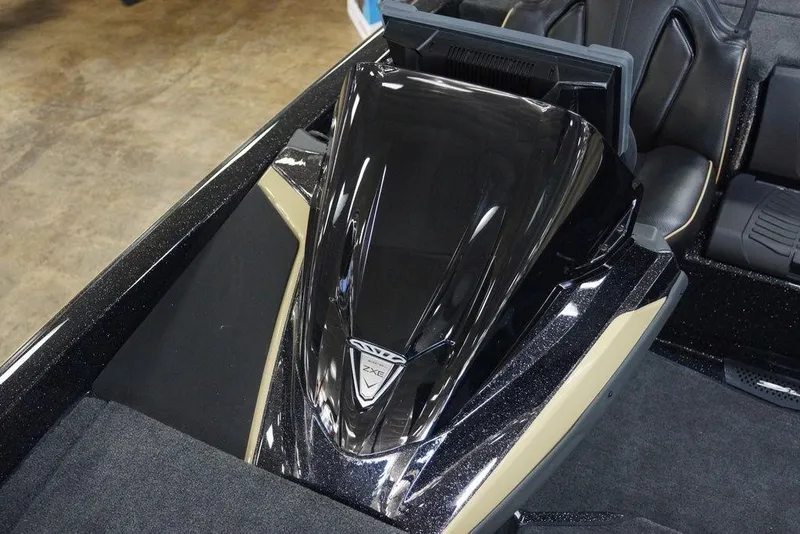 Slide: The Image of 2026 Skeeter ZXE21 boat interior with sleek black design and modern seating. - 16
