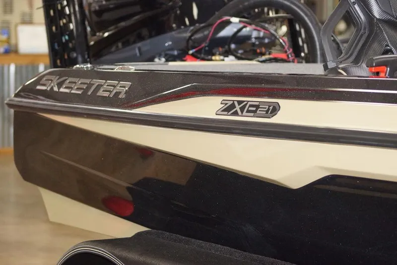 Slide: The Image of 2026 Skeeter ZXE21 boat, close-up of model name and logo on the side. - 28