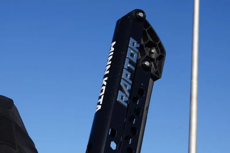 Slide: The Image of 2024 Skeeter FXR21 Limited with Minn Kota Raptor against clear blue sky. - 14