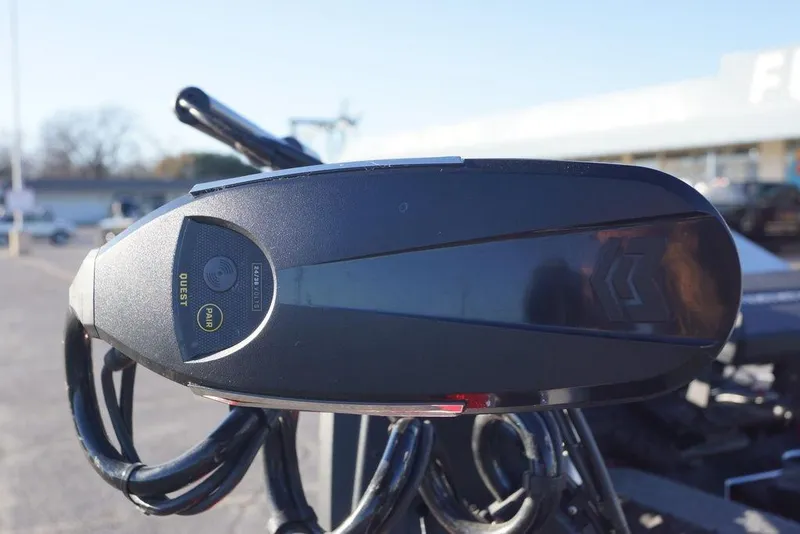 Slide: The Image of Close-up of 2024 Skeeter FXR21 Limited boat control panel outdoors. - 16