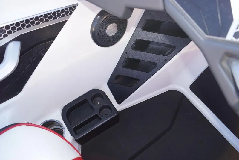 Slide: The Image of 2024 Skeeter FXR21 Limited interior detail with speaker and storage compartments. - 3