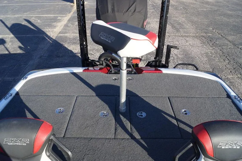 Slide: The Image of 2024 Skeeter FXR21 Limited boat deck with seating and storage compartments. - 5