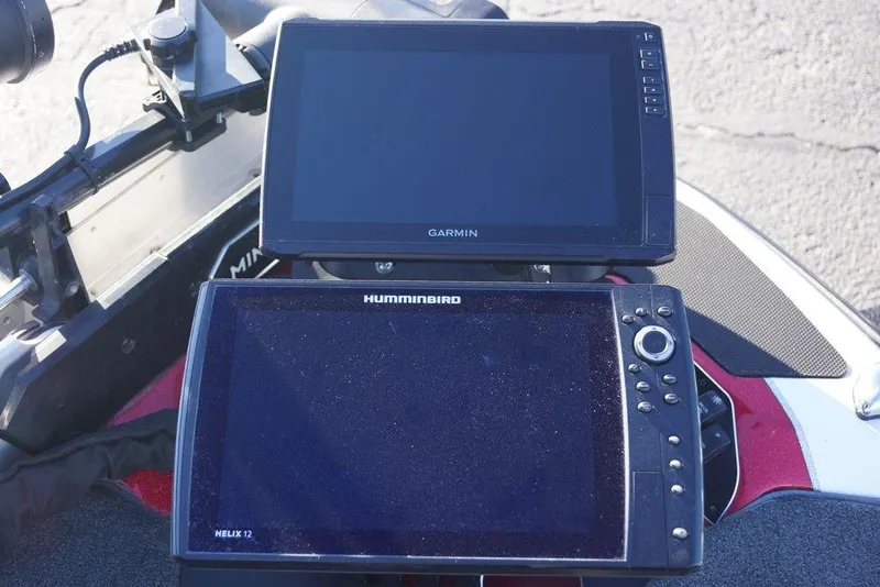 Slide: The Image of 2024 Skeeter FXR21 Limited with Garmin and Humminbird navigation displays. - 7