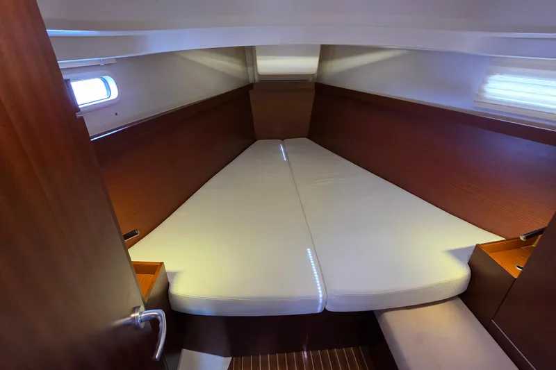 Slide: The Image of Cozy cabin interior of 2014 Hanse 385 yacht with comfortable bedding. - 20