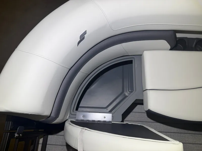 Slide: The Image of The interior view of a 2026 Starcraft EX 20 Q DH features white upholstery and a modern design. - 12