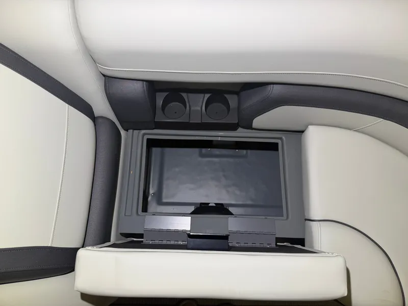 Slide: The Image of Interior view of a 2026 Starcraft EX 20 Q DH with gray and white upholstery. - 18
