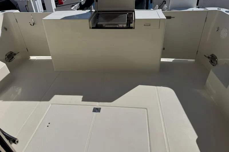 Slide: The Image of Spacious deck of 2002 Hampton 550 yacht with clean, white finish. - 13