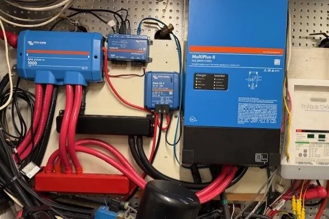 Slide: The Image of Electrical system setup with Victron Energy components in a 2002 Hampton 550 yacht. - 48